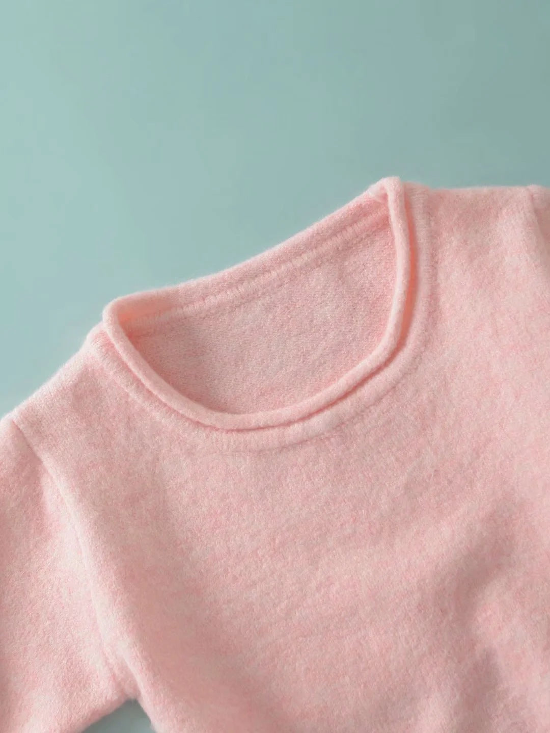 Pull rose à manches courtes