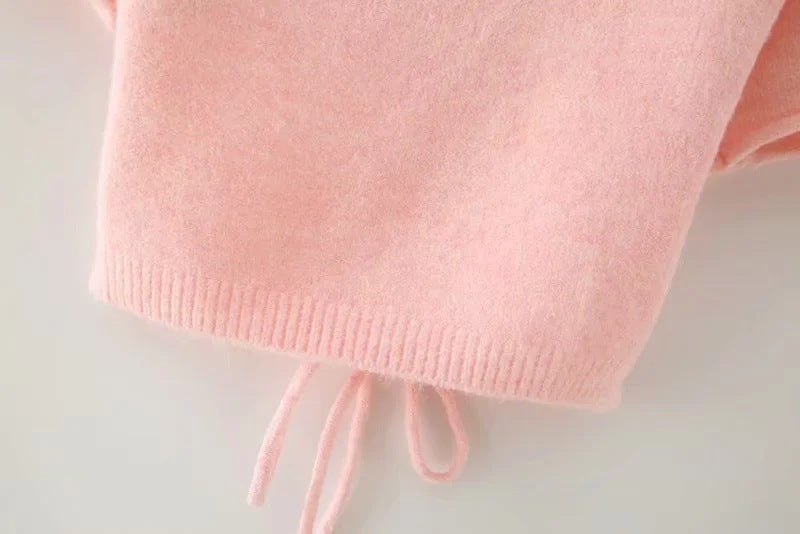 Pull rose à manches courtes