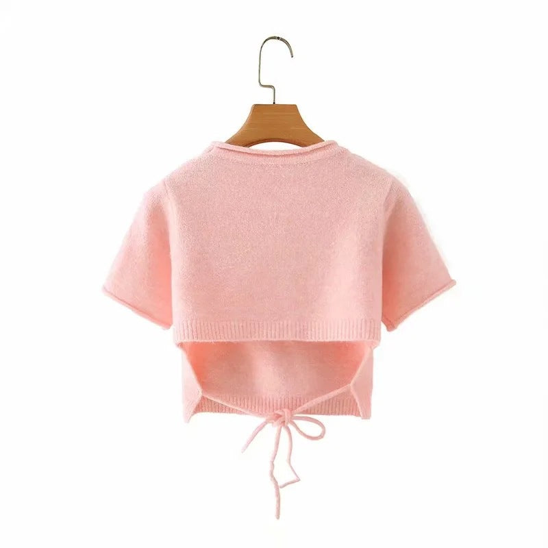 Pull rose à manches courtes
